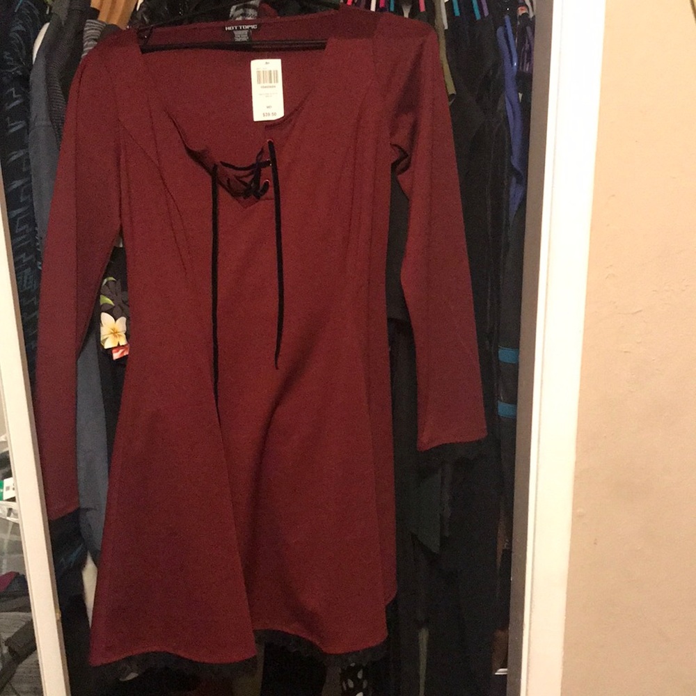 Red long sleeve dress with black lace trim